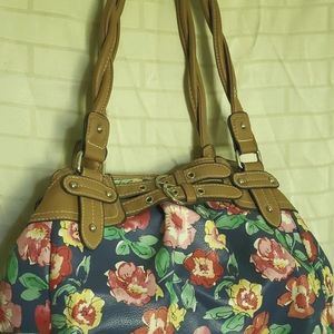 Faux leather purse with flower details